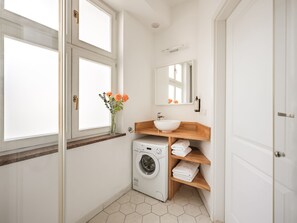 Hair dryer, towels, soap, toilet paper