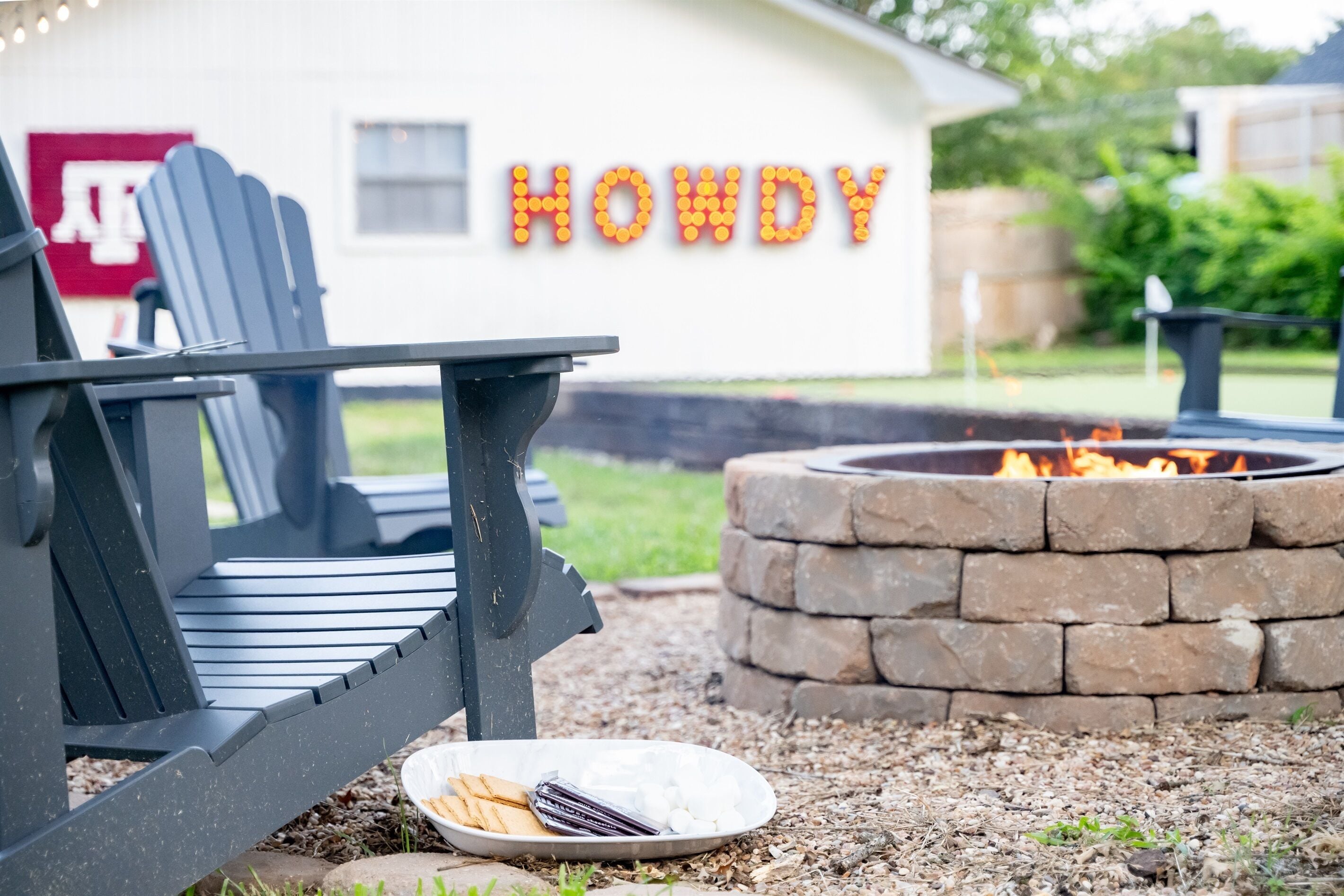 Unwind under the string lights after playing putt-putt - evenings around the fire pit don't get better than this!