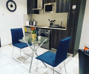 Duplex exécutif | Cuisine privée | Réfrigérateur, four à micro-ondes, un four, surface de cuisson