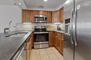 Condo, 1 Bedroom | Private kitchen | Fridge, oven, coffee/tea maker, toaster