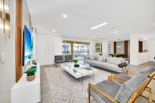 Villa, varias habitaciones | Área de sala de estar