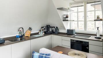 Classic Apartment, Balcony | Private kitchen | Electric kettle