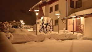 A snow-covered building with a visible entrance and a sign that reads "fai". - Apartment in Fulpmes Near Stubai Glacier (Fulpmes)