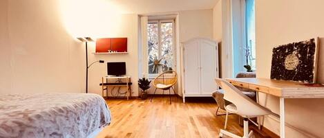 1 slaapkamer, een strijkplank/strijkijzer, wifi, beddengoed