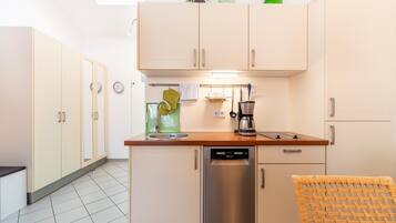Apartment | Private kitchen | Electric kettle, toaster, high chair