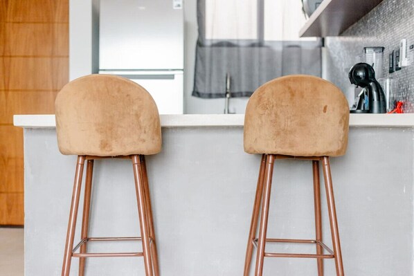 Fridge, microwave, stovetop, coffee/tea maker