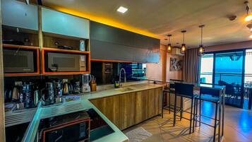 Fridge, microwave, oven, cookware/dishes/utensils