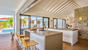 Superior Villa, Pool View | Private kitchen | Fridge, microwave, oven, stovetop