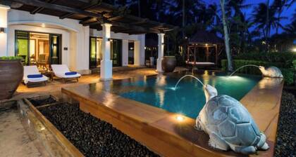 A 5-star beachfront J W Marriott resort, steps from Mai Khao Beach.