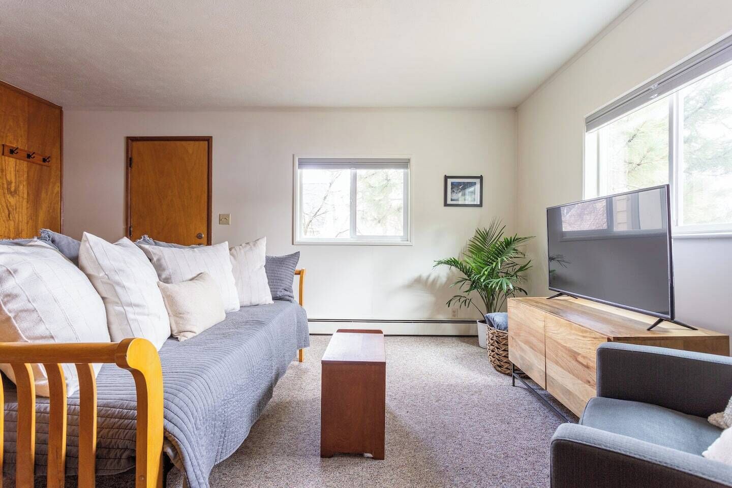 The space is clean, cozy, and practical - uncluttered but well-appointed.