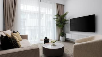 Apartamento Deluxe, balcón, vistas a la ciudad | Zona de estar