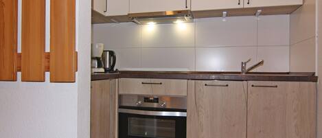 Apartment | Private kitchen | Electric kettle, toaster, highchair