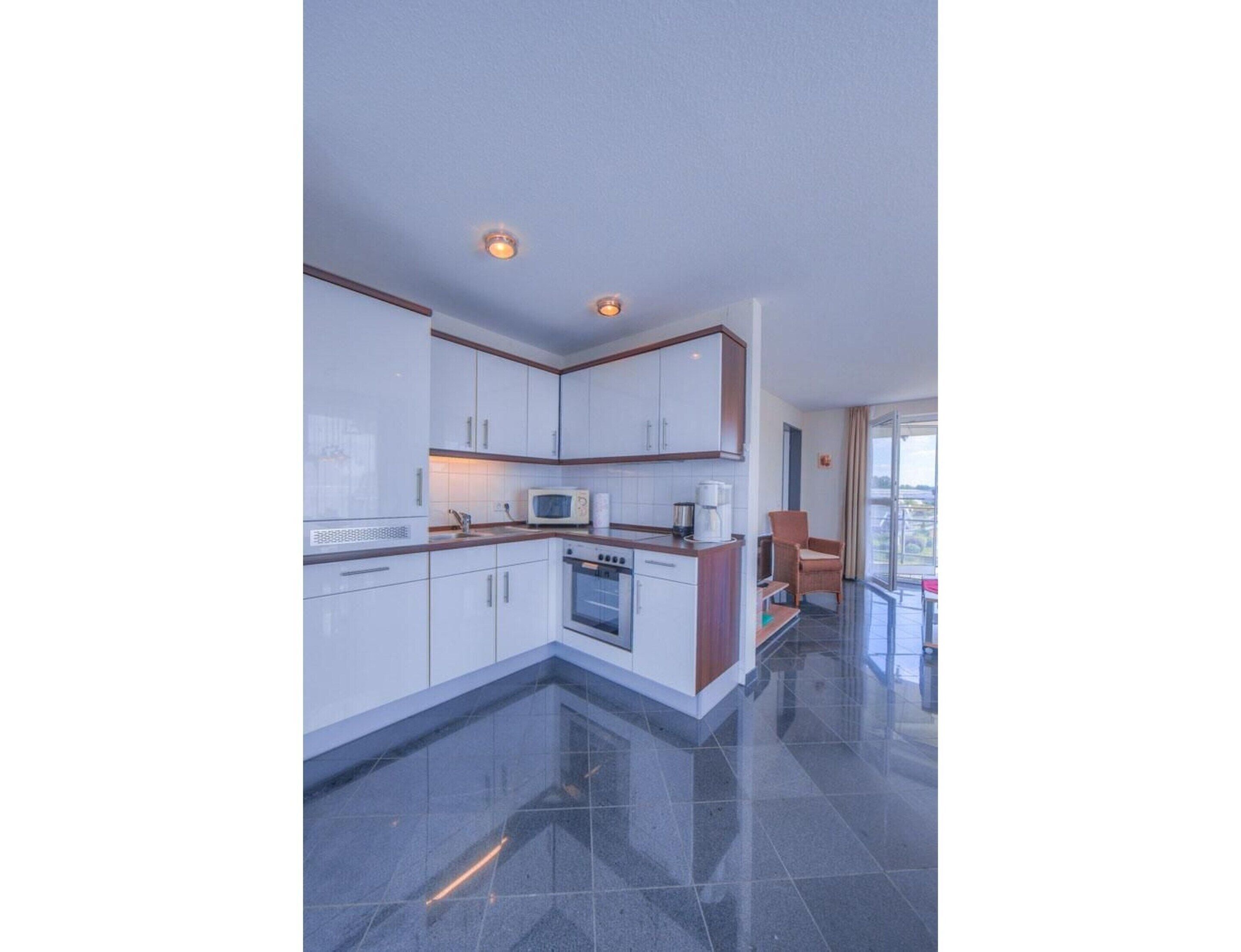 Apartment | Private kitchen | Electric kettle, toaster, high chair