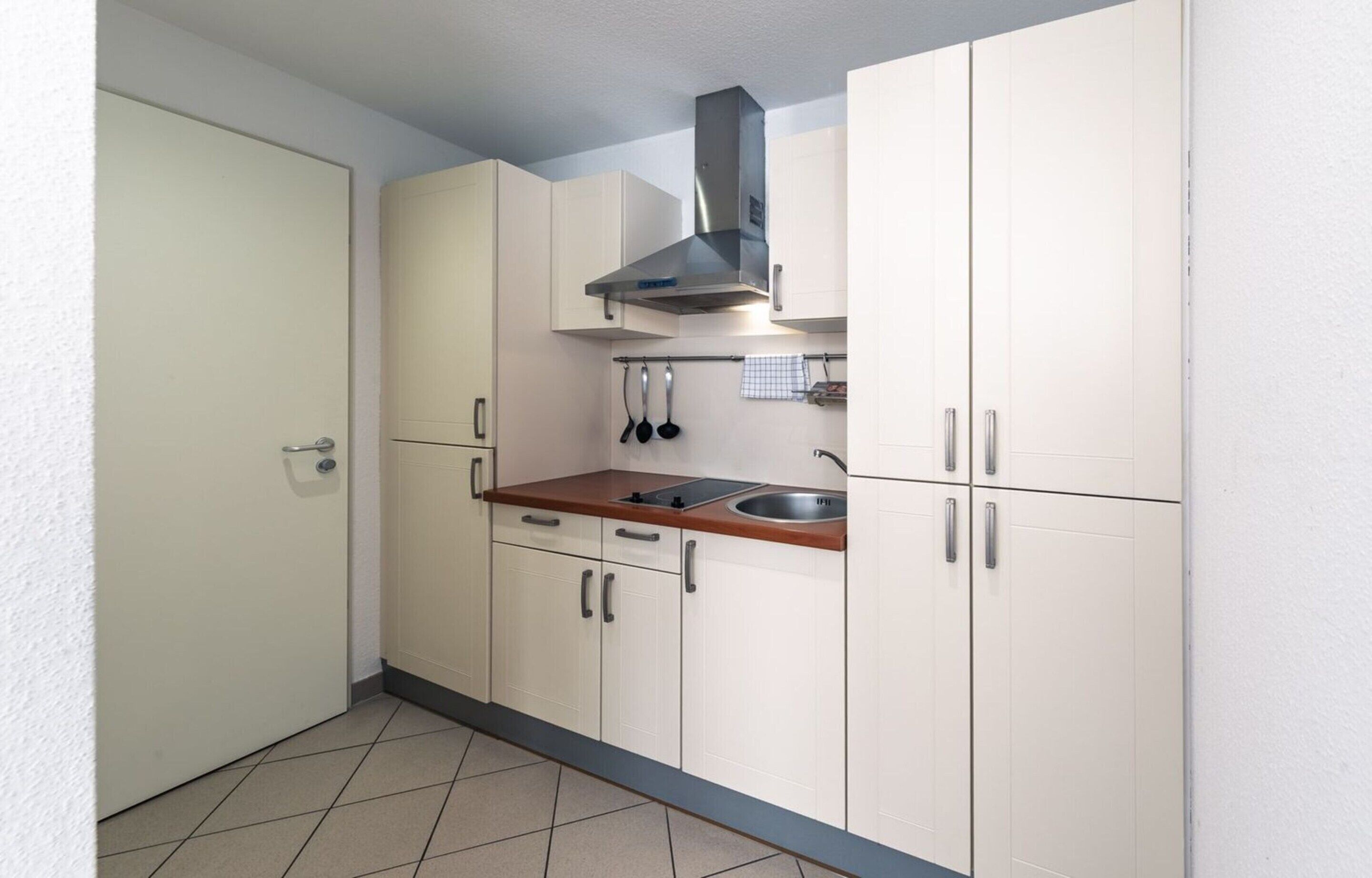 Apartment | Private kitchen | Electric kettle, toaster, highchair