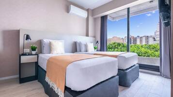 Family Apartment, Balcony, City View | 1 bedroom, in-room safe, desk, soundproofing