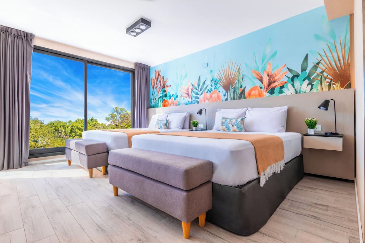 Studio, 2 Queen Beds | In-room safe, soundproofing, cribs (free), WiFi (free)