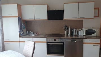 Apartment | Private kitchen | Electric kettle, toaster, high chair