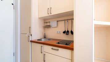 Apartment | Private kitchen | Electric kettle, toaster, high chair