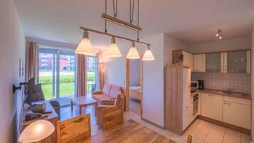 Apartment | Private kitchen | Electric kettle, toaster, high chair