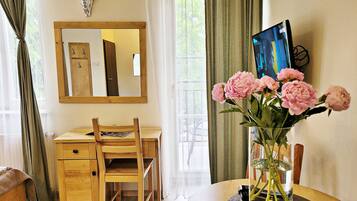 Standard Studio Suite, City View | In-room safe, desk, laptop workspace, iron/ironing board