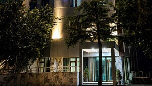 A multi-story hotel with a prominent illuminated sign reading 'CITY BLUE HOTEL'. - City Blue Hotel (Elazig)