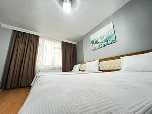 Chambre Triple, vue ville