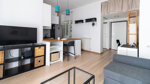 A modern apartment with a living room, kitchen, and dining area. - Italianway Comfort - Gallura 9 B (Milan)