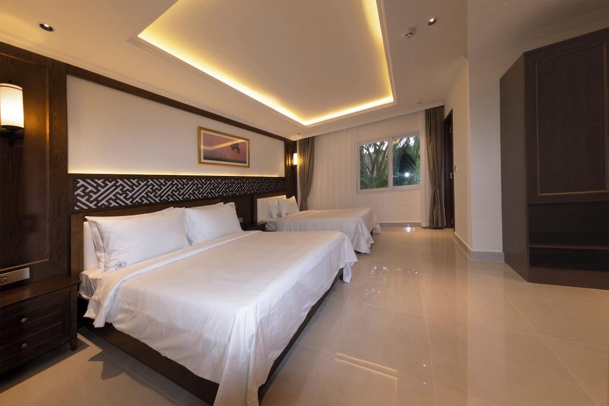 Family Twin Room, 1 Bedroom, Garden View | In-room safe, desk, free WiFi, bed sheets