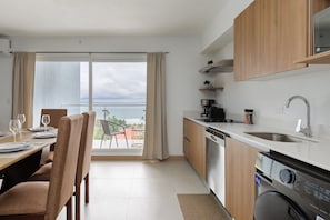 Fridge, microwave, dishwasher, coffee/tea maker