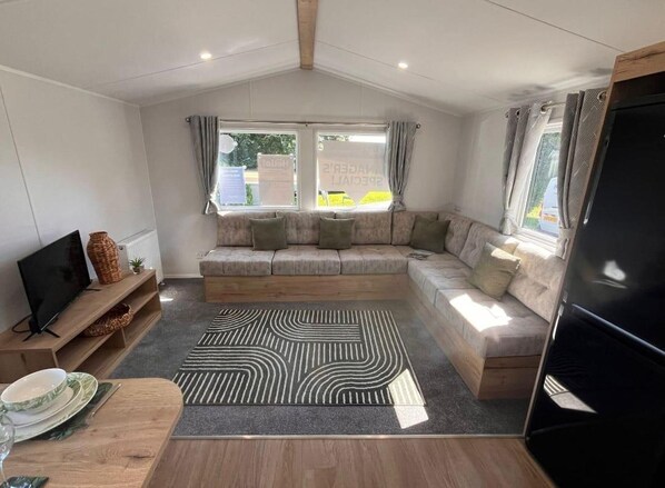 Ferienhütte | Wohnbereich | Fernseher