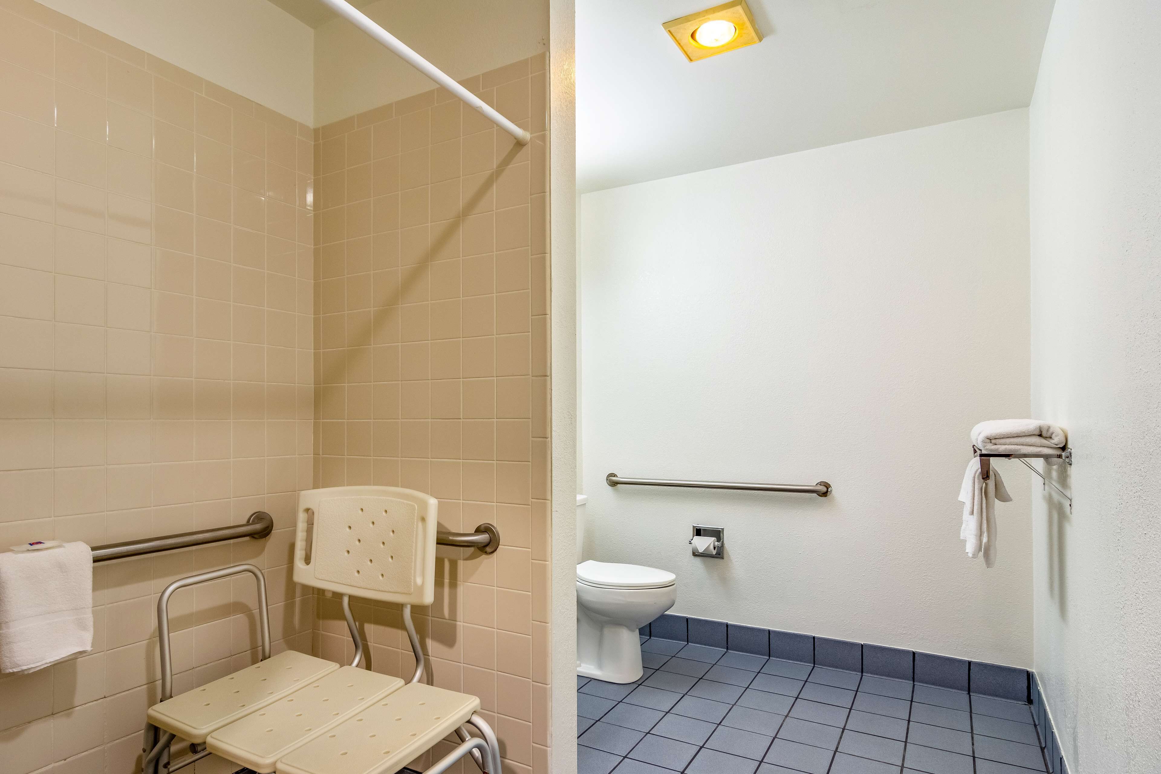 Standard Room, 2 Queen Beds, Non Smoking | Bathroom shower