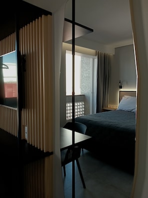 Minibar, blackout curtains, soundproofing, iron/ironing board