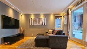 Gemeinsamer Schlafsaal, 1 Schlafzimmer, barrierefrei, Balkon | Wohnbereich