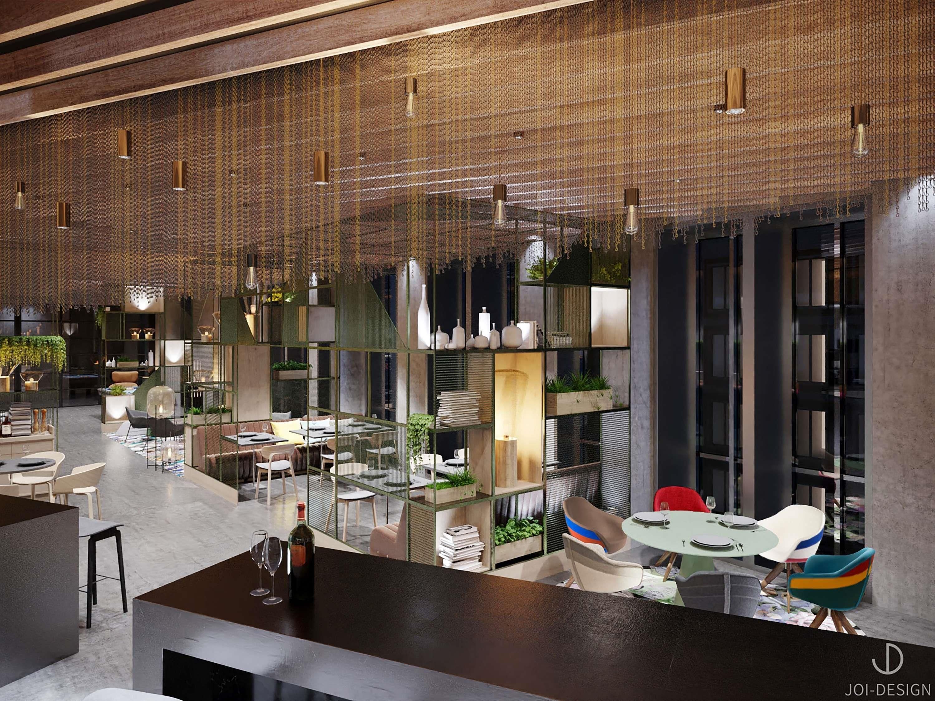 Un intérieur moderne avec un bar central, des espaces aménagés pour s’asseoir et des éléments décoratifs.