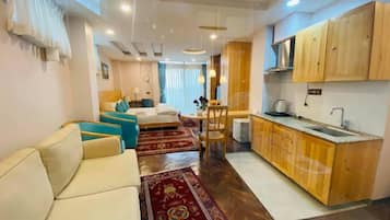 Deluxe Studio, 1 Queen Bed, Balcony, City View | Premium bedding, individually decorated, individually furnished, desk