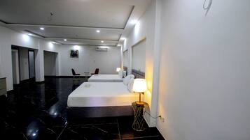 Family Suite | 1 bedroom, in-room safe, individually furnished, desk