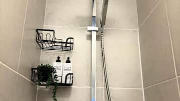 Shower, hair dryer, towels, toilet paper