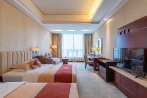 A hotel room with two beds, a desk, a television, and a large window. - Huayu International Hotel (Xiangtan)