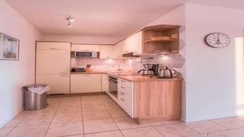 Apartment | Private kitchen | Electric kettle, toaster, high chair
