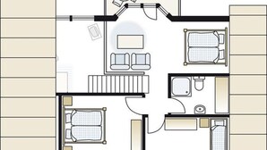 Ein Hotelzimmer mit zwei Betten, einer Sitzecke, einem Badezimmer und einer Küchenzeile.