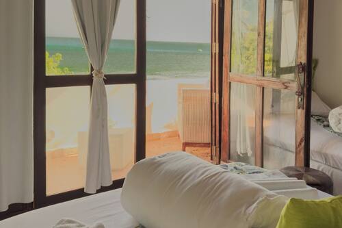Suíte luxo, vista para a praia | Cofres nos quartos, cortinas blackout, Wi-Fi de cortesia