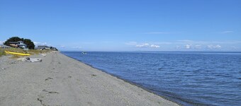 Beachfront house overlooking Dungeness Bay with hot tub