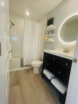 Eco-friendly toiletries, hair dryer, towels, soap