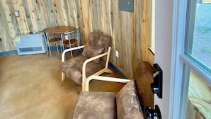 A wooden interior with a sofa, chairs, and a table. - Up-cycled Grain Bin Villa just 20 mins. from the Great Sand Dunes NP w/ WiFi, AC (Mosca)