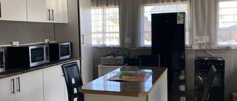 Quarto família, sacada, vista para o jardim | Cozinha privada