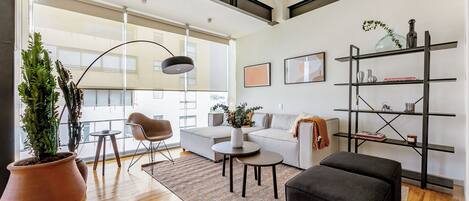 Deluxe Apartment | Living area | TV