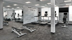 A modern gym with treadmills, elliptical machines, and weight benches. - Fairfield By Marriott Inn & Suites Cornelia (Cornelia)