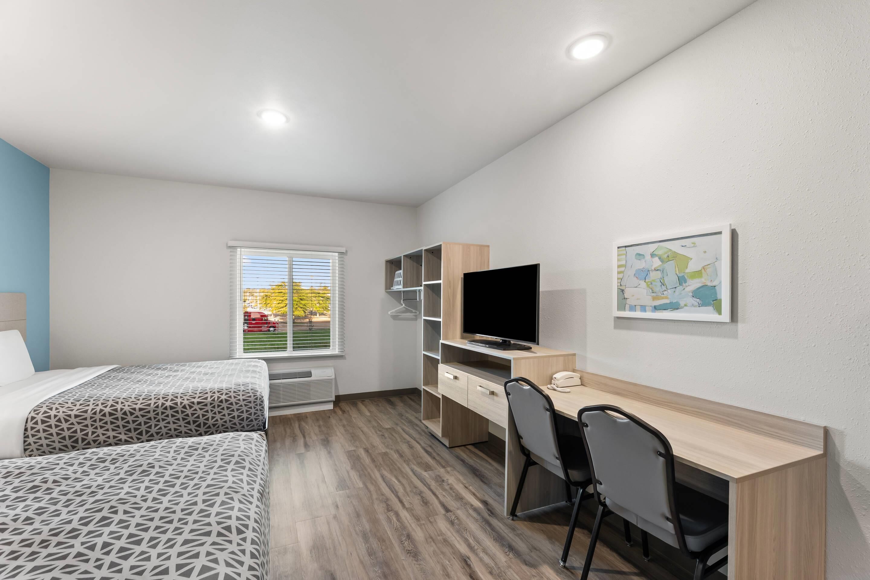 Suite, 2 Queen Beds, Non Smoking (w/ Dishwasher) | Desk, free WiFi, bed sheets