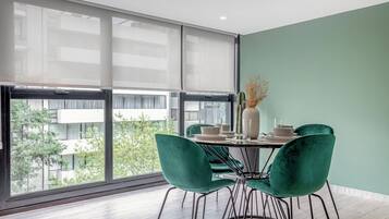 Apartamento Deluxe | Comedor