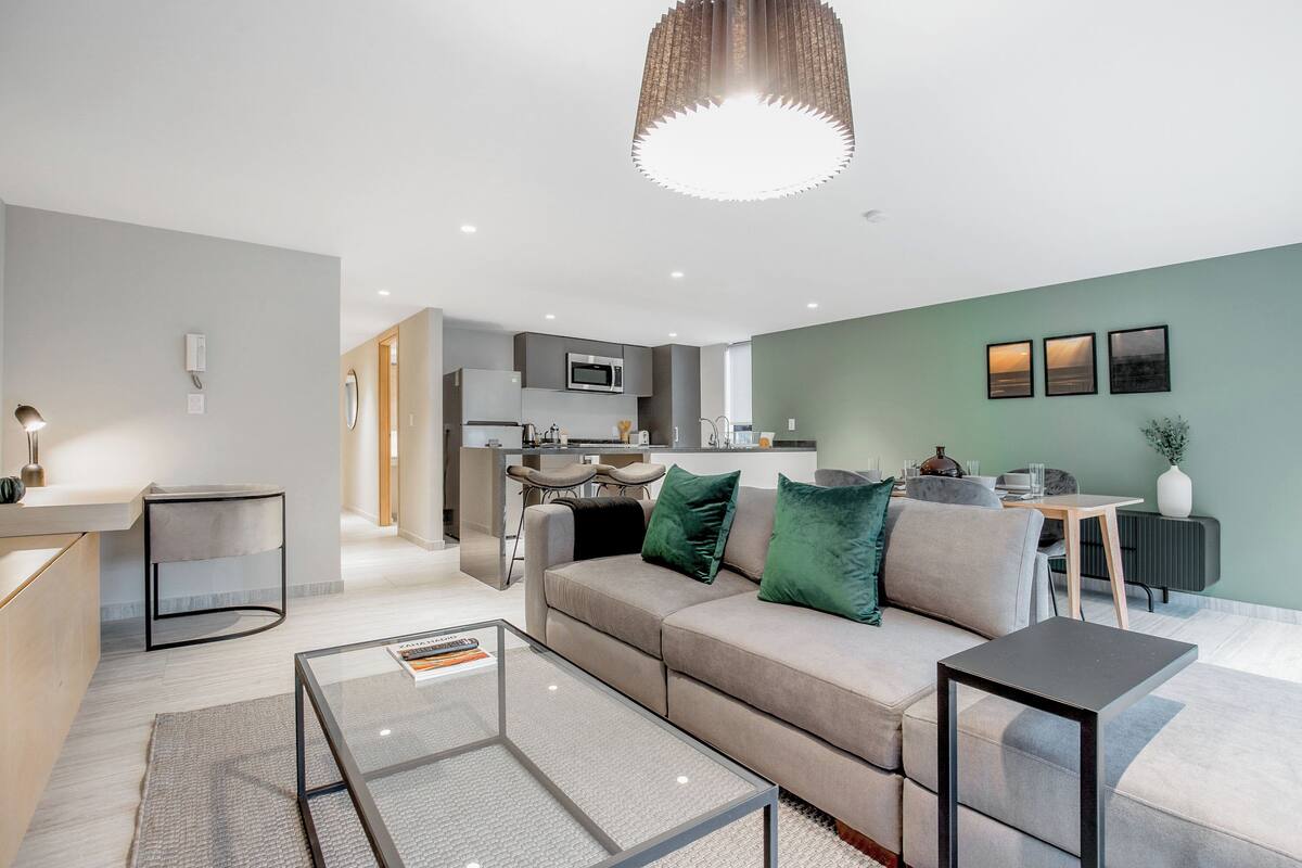 Premium-Apartment | Wohnbereich | Fernseher